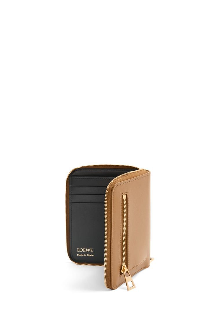 Knot compact zip around wallet in shiny nappa calfskin