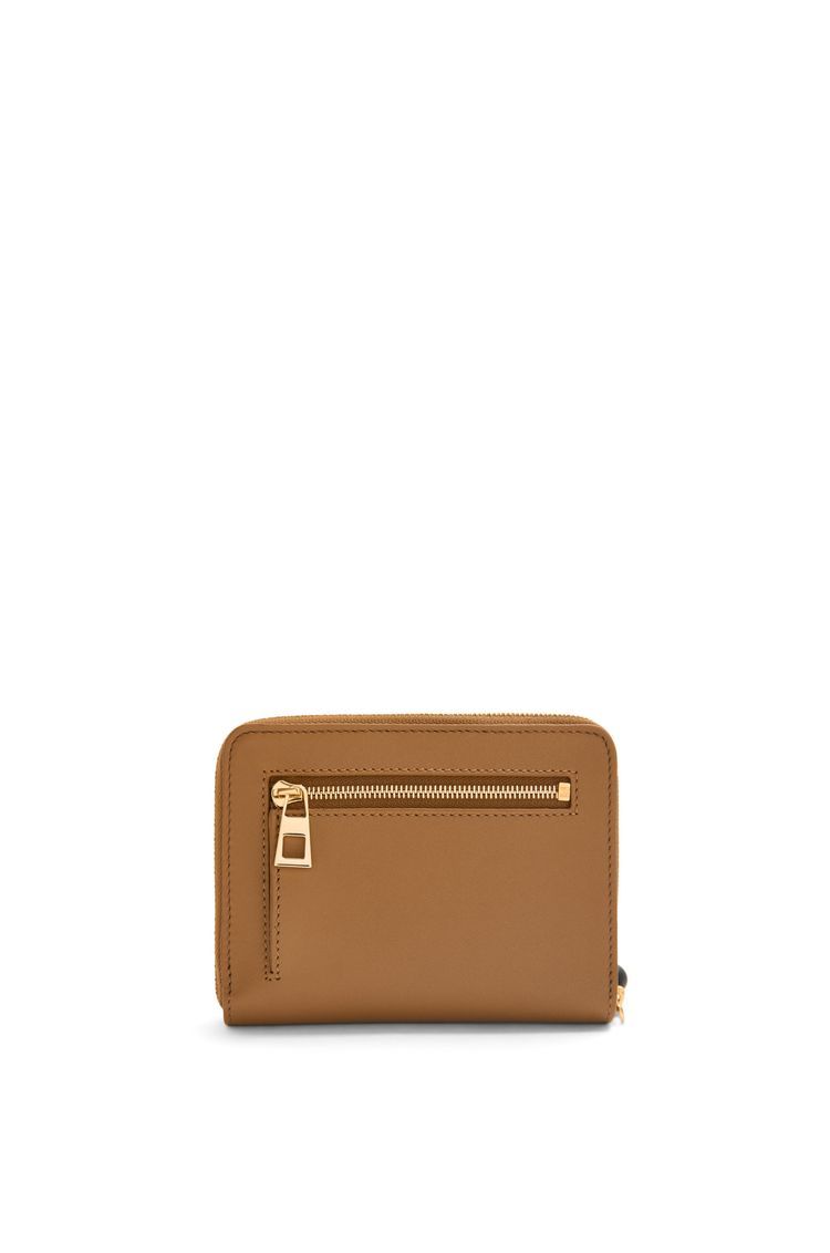 Knot compact zip around wallet in shiny nappa calfskin