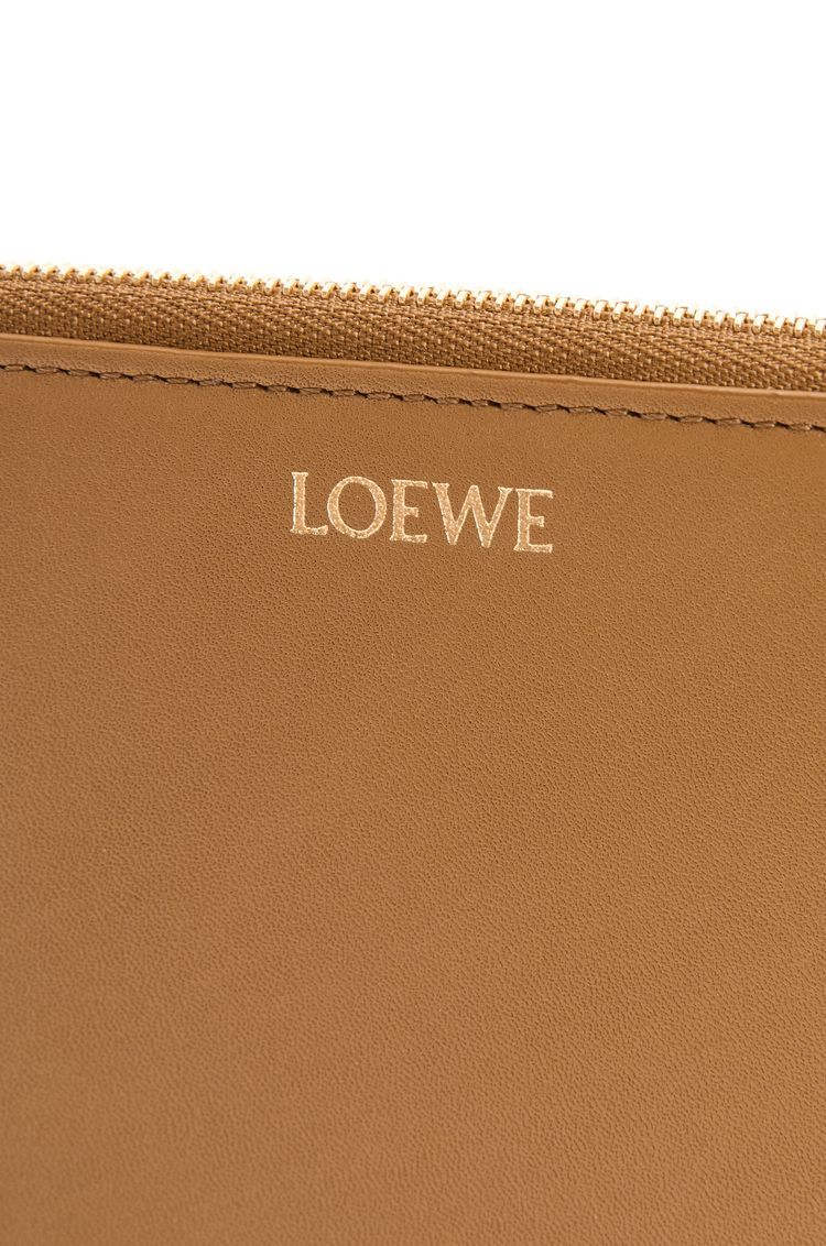 Knot compact zip around wallet in shiny nappa calfskin