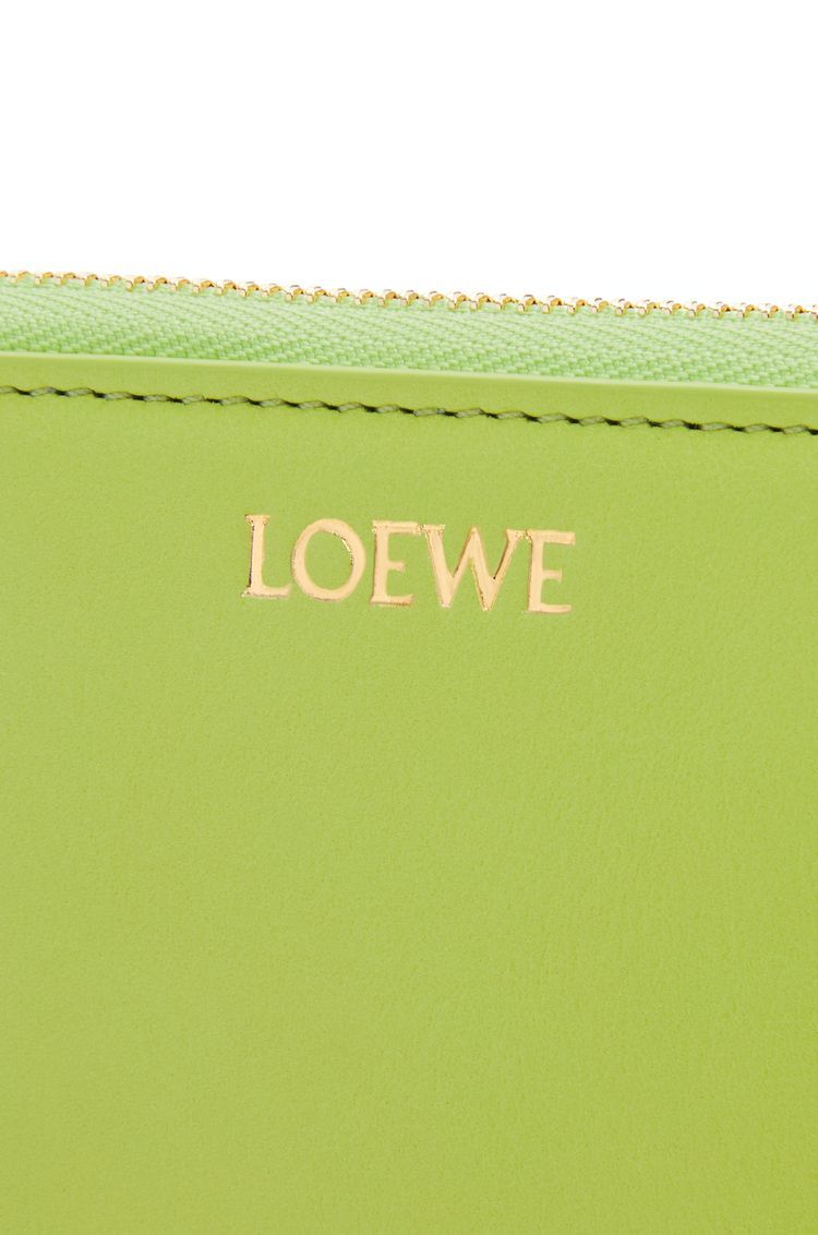 Knot compact zip around wallet in shiny nappa calfskin