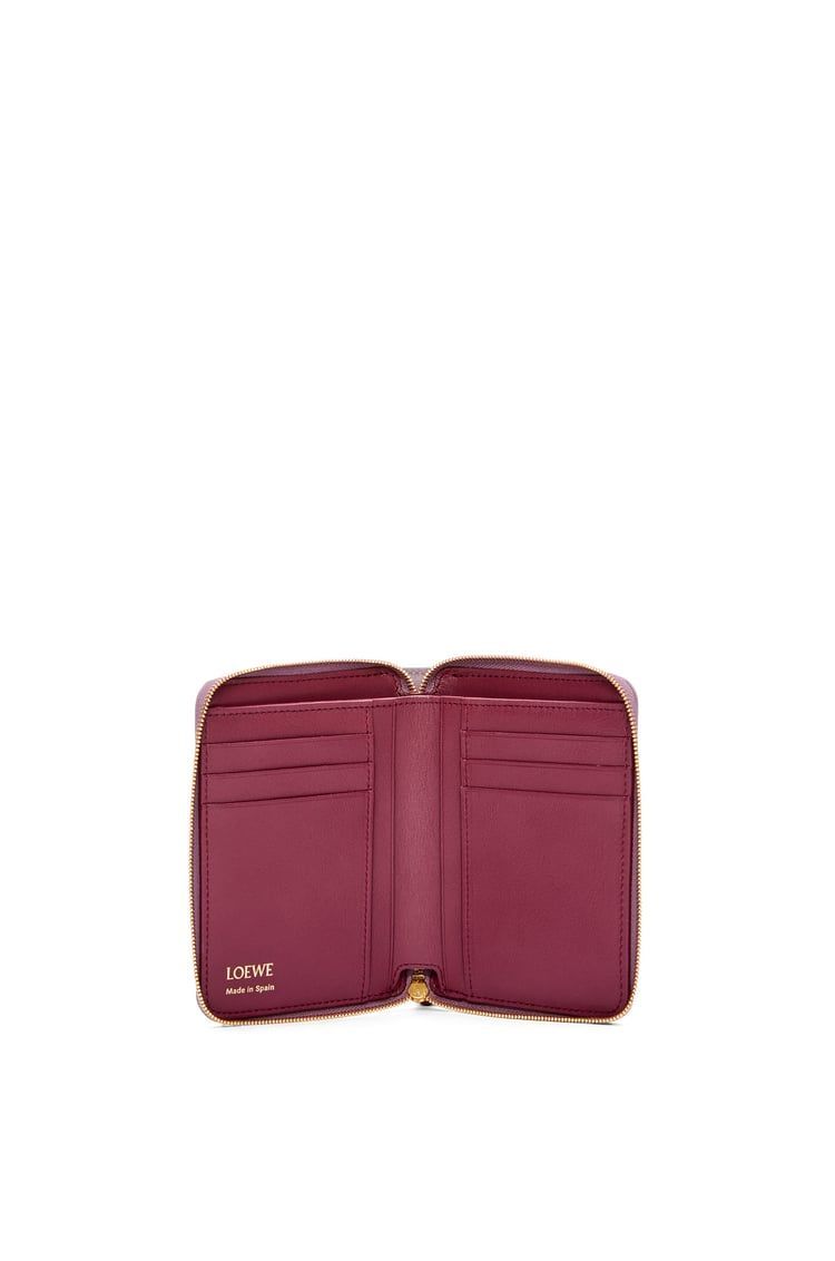 Knot compact zip around wallet in shiny nappa calfskin
