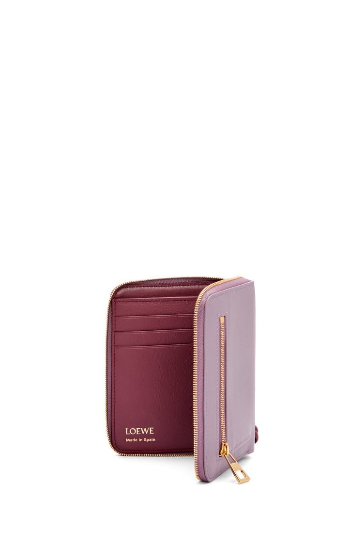 Knot compact zip around wallet in shiny nappa calfskin