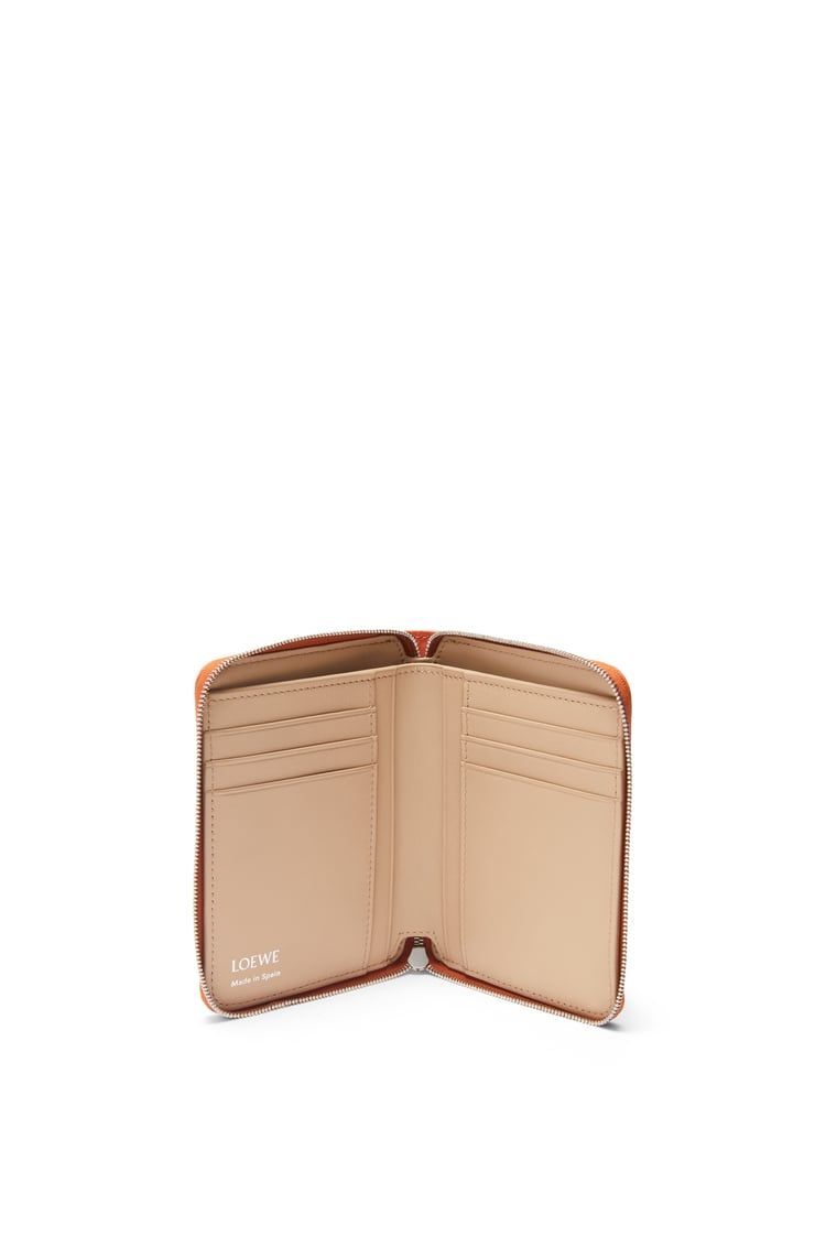 Knot compact zip around wallet in shiny nappa calfskin
