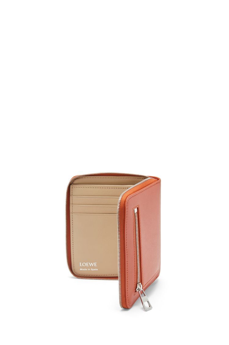 Knot compact zip around wallet in shiny nappa calfskin