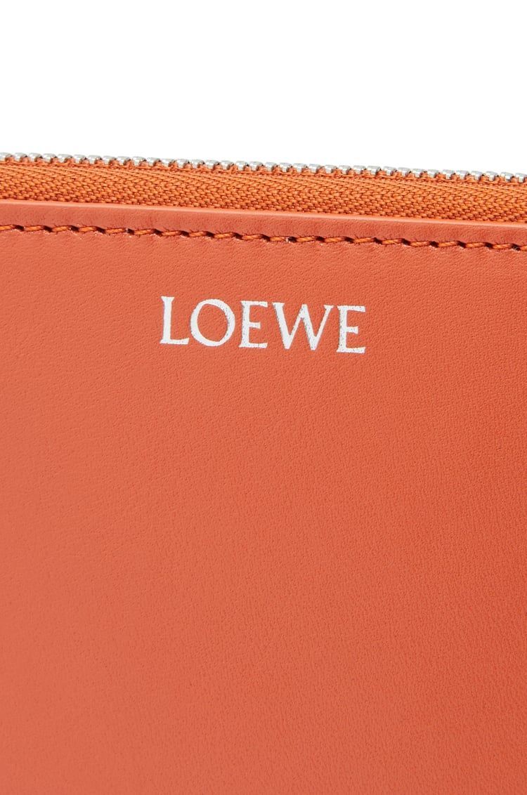 Knot compact zip around wallet in shiny nappa calfskin