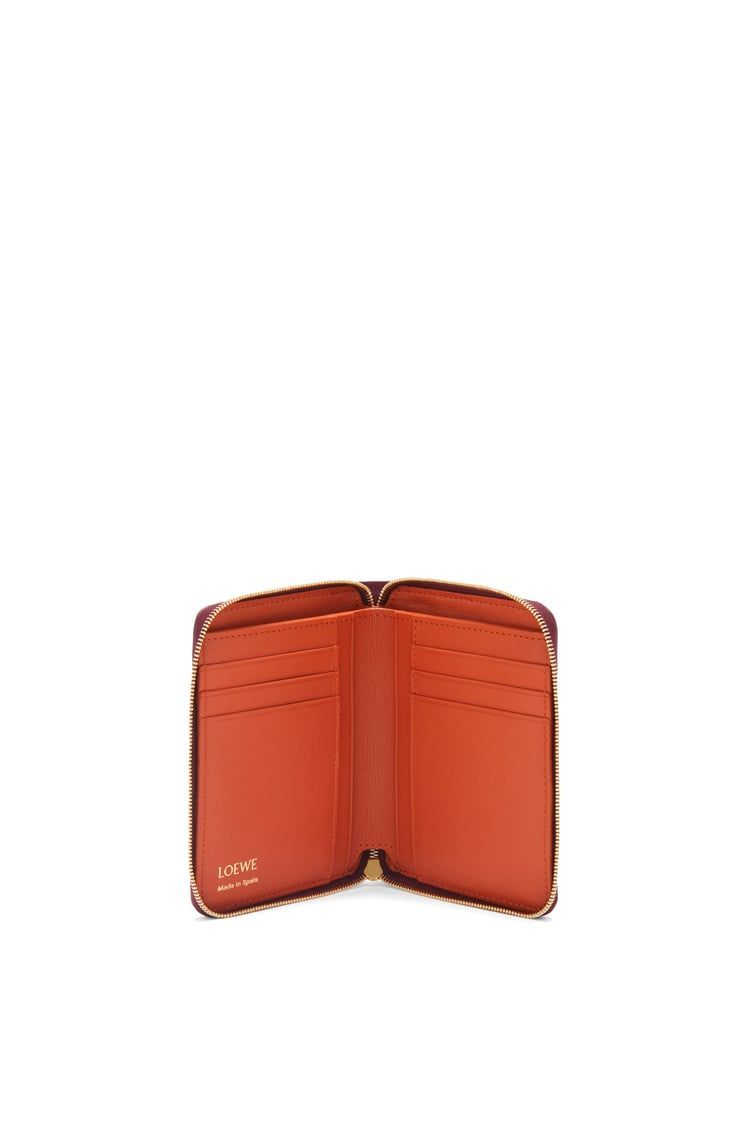 Knot compact zip around wallet in shiny nappa calfskin