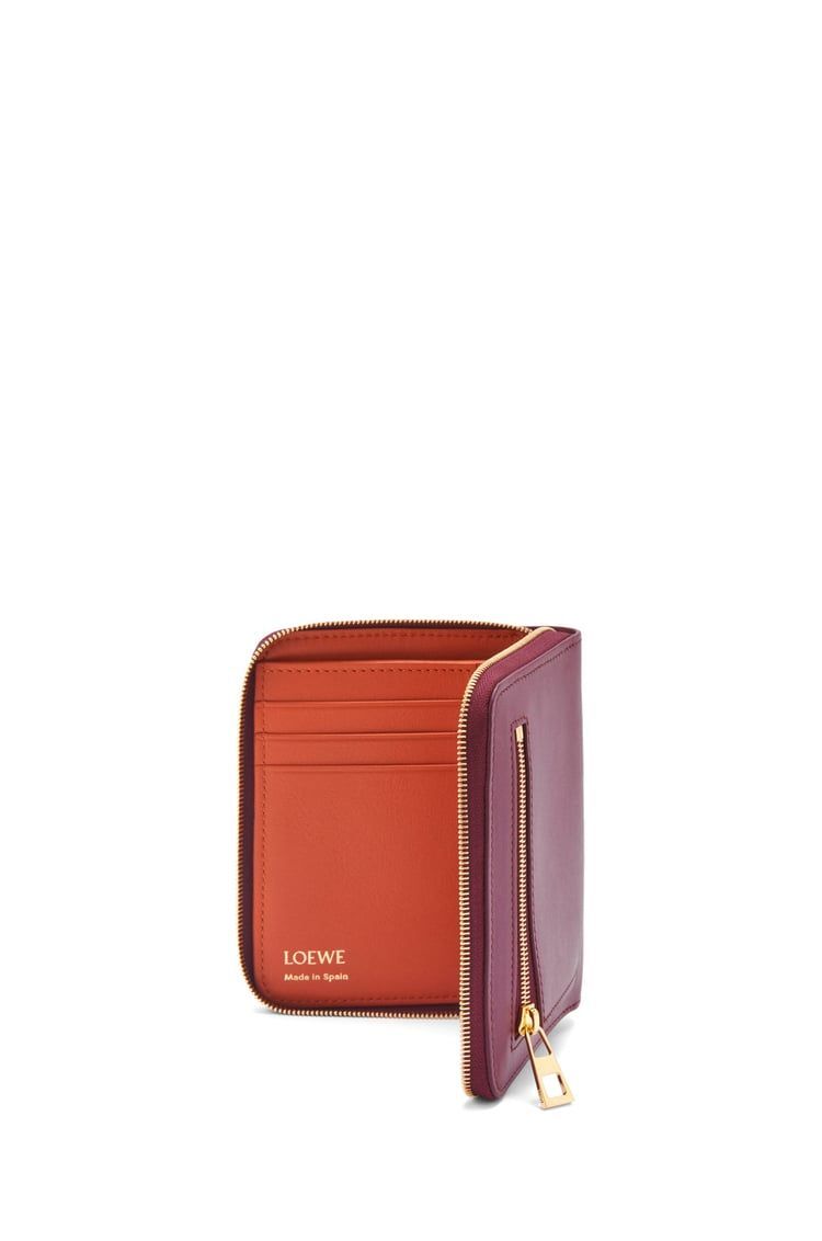 Knot compact zip around wallet in shiny nappa calfskin