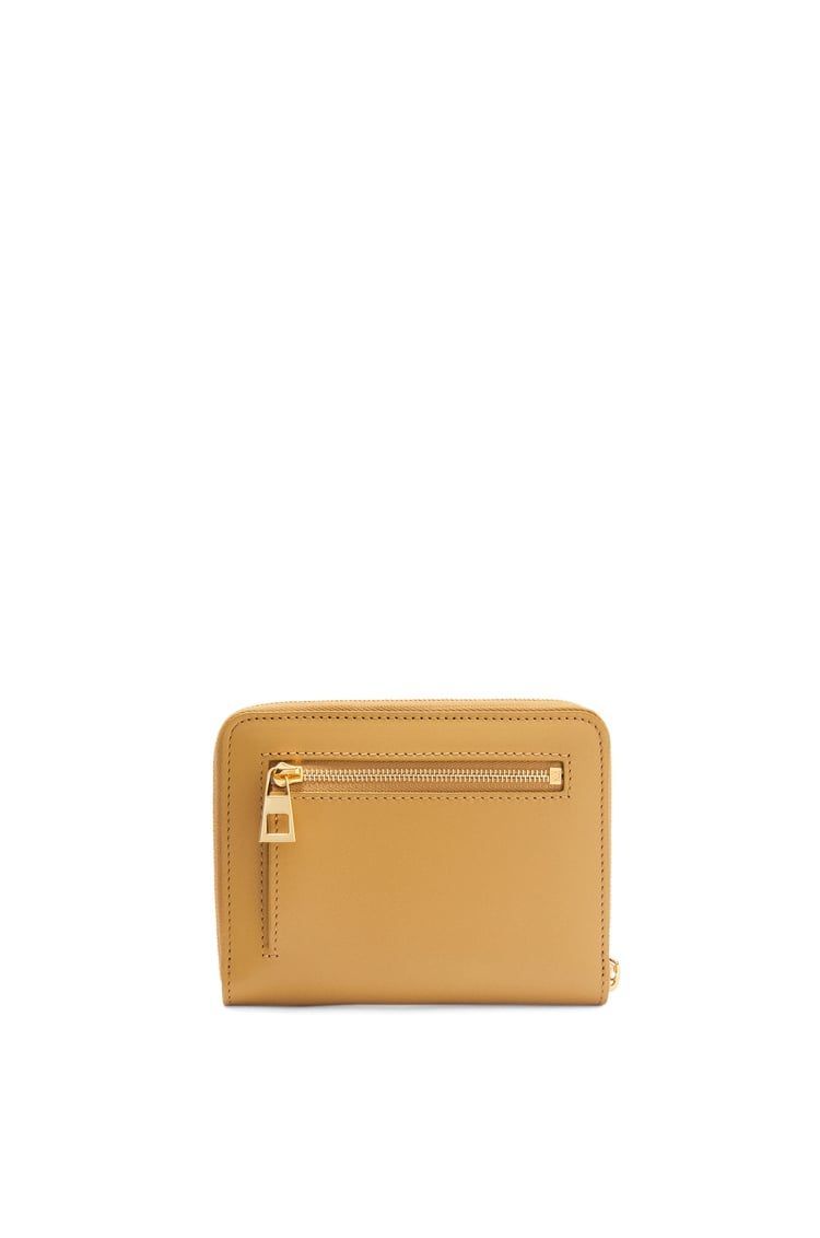 Knot compact zip around wallet in shiny nappa calfskin