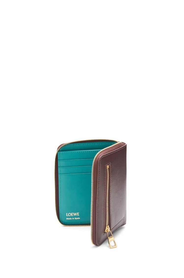 Knot compact zip around wallet in shiny nappa calfskin