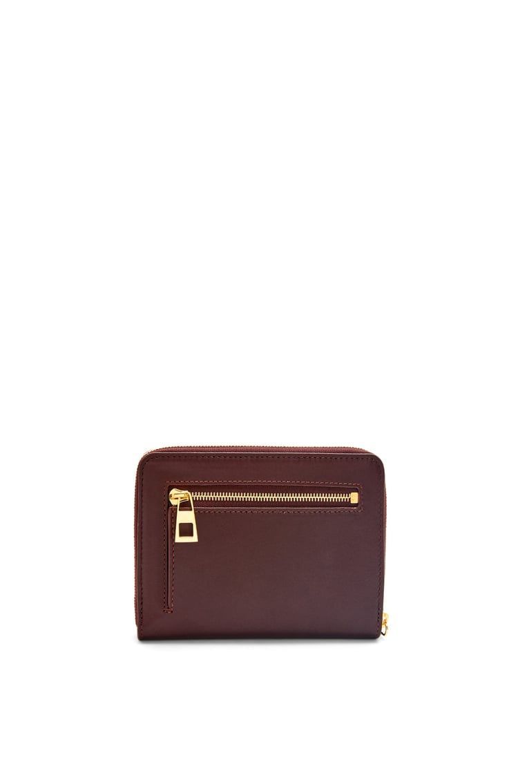 Knot compact zip around wallet in shiny nappa calfskin