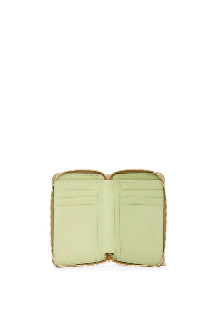 Knot compact zip around wallet in shiny nappa calfskin