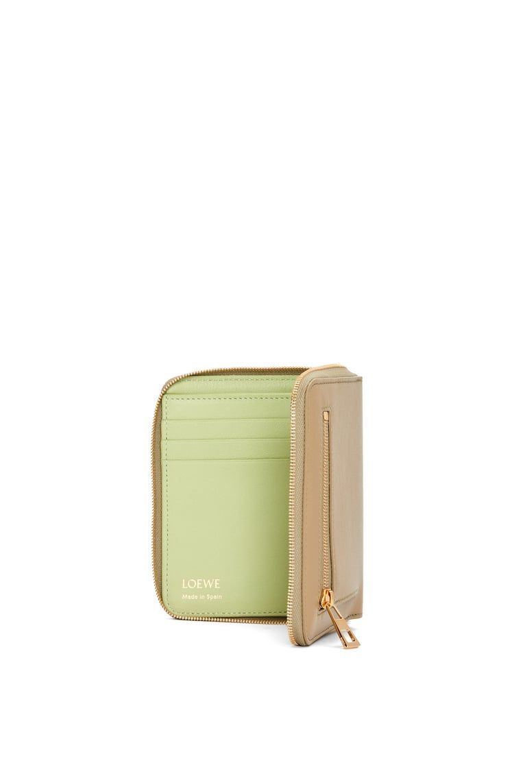 Knot compact zip around wallet in shiny nappa calfskin