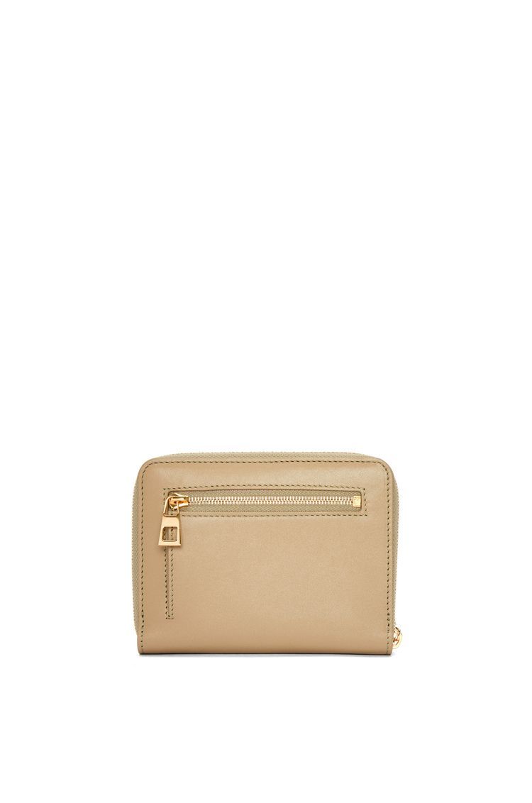 Knot compact zip around wallet in shiny nappa calfskin