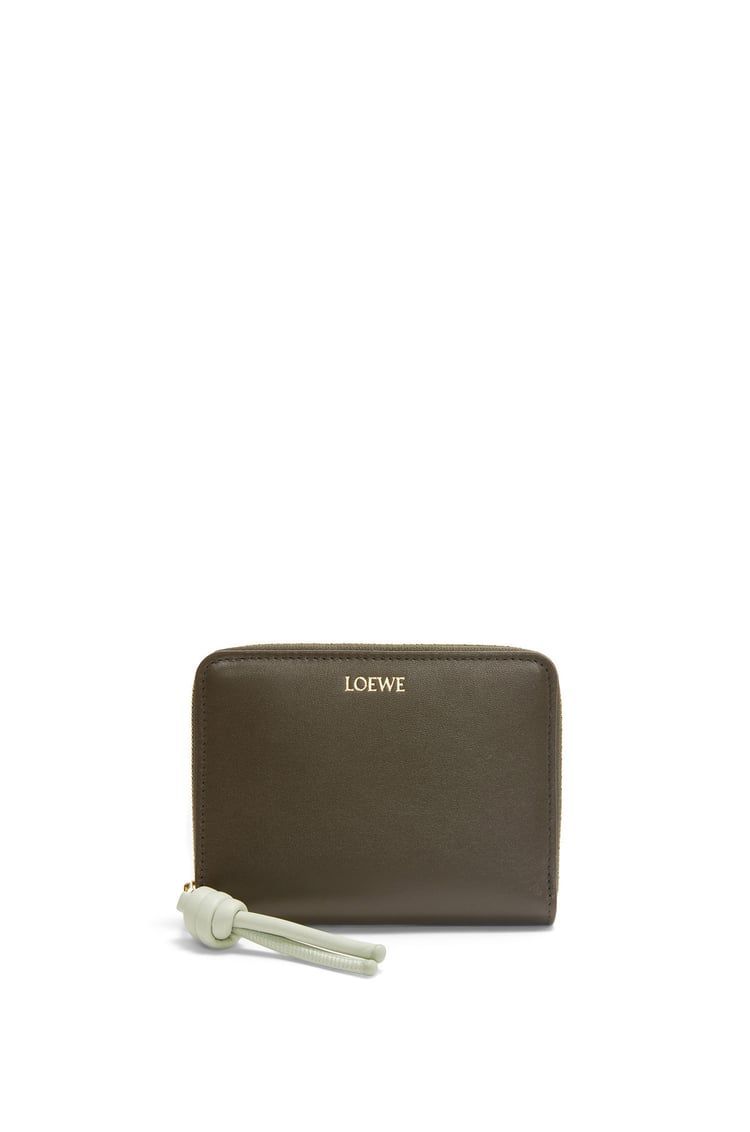 Knot compact zip around wallet in shiny nappa calfskin