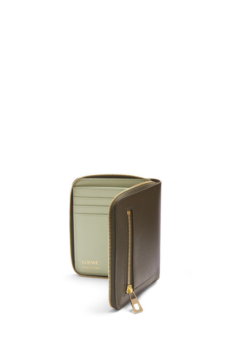 Knot compact zip around wallet in shiny nappa calfskin