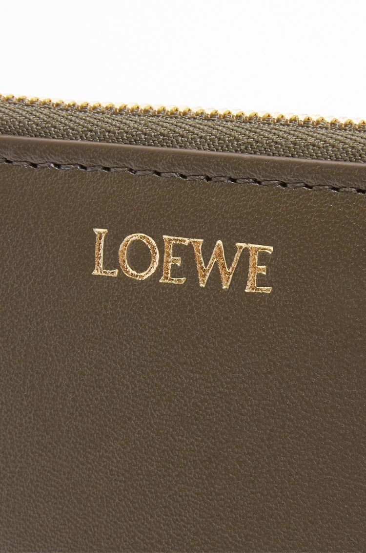 Knot compact zip around wallet in shiny nappa calfskin