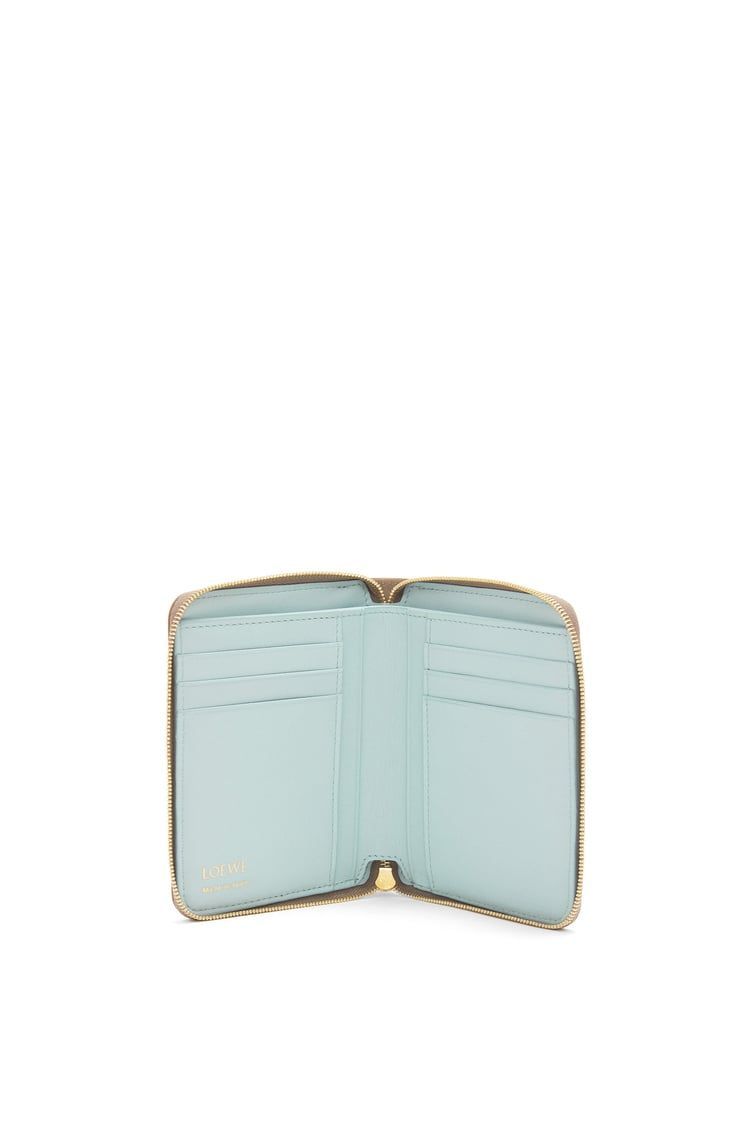 Knot compact zip around wallet in shiny nappa calfskin