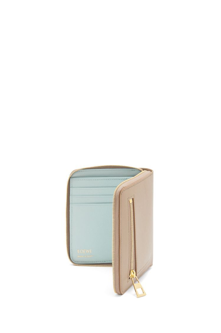 Knot compact zip around wallet in shiny nappa calfskin
