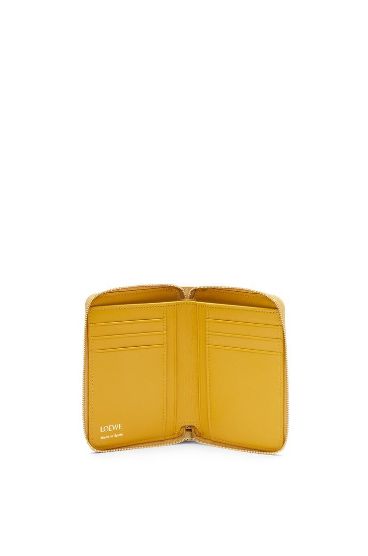 Knot compact zip around wallet in shiny nappa calfskin