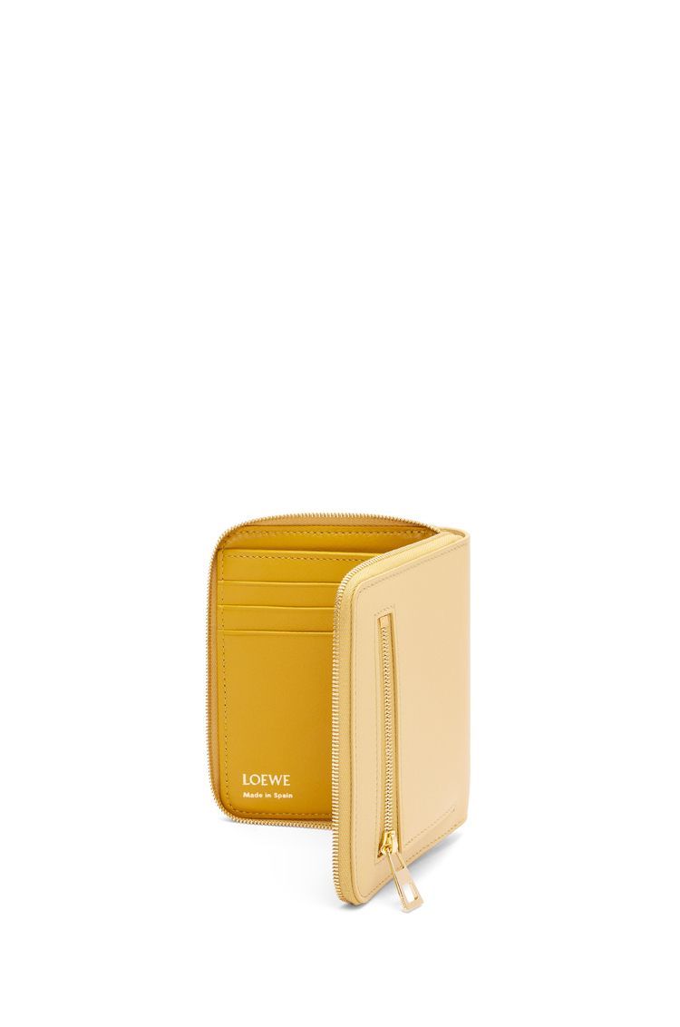 Knot compact zip around wallet in shiny nappa calfskin