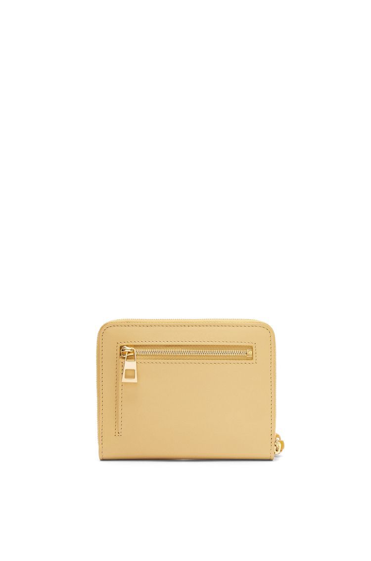 Knot compact zip around wallet in shiny nappa calfskin