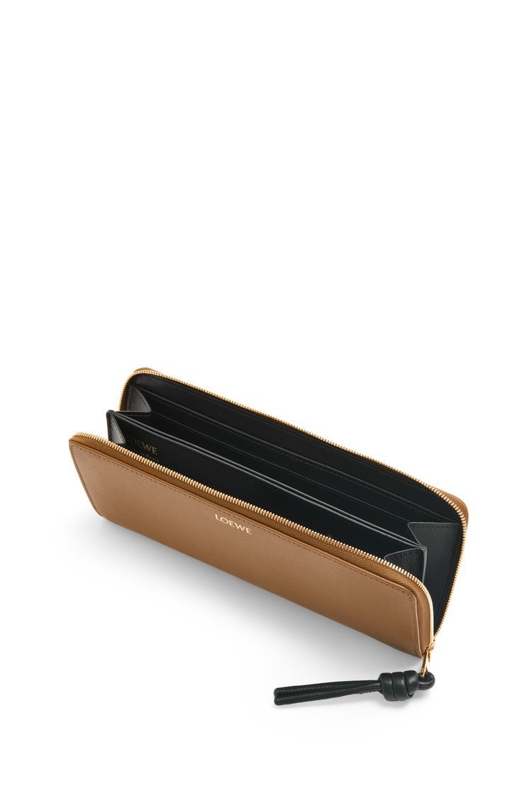Knot zip around wallet in shiny nappa calfskin