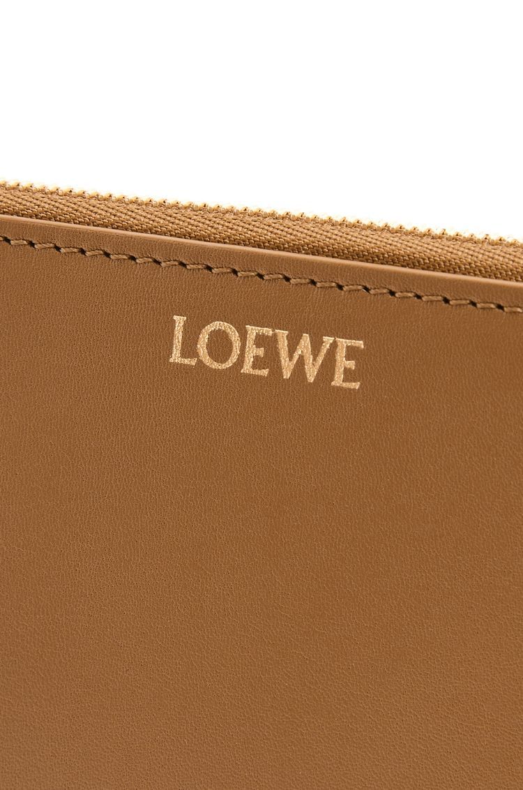 Knot zip around wallet in shiny nappa calfskin