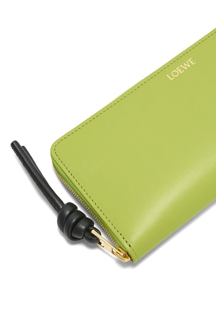 Knot zip around wallet in shiny nappa calfskin