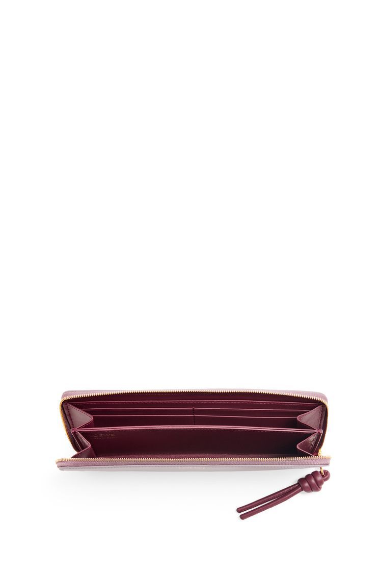Knot zip around wallet in shiny nappa calfskin