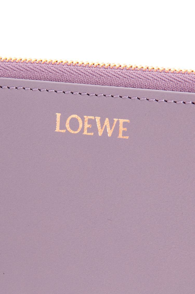 Knot zip around wallet in shiny nappa calfskin