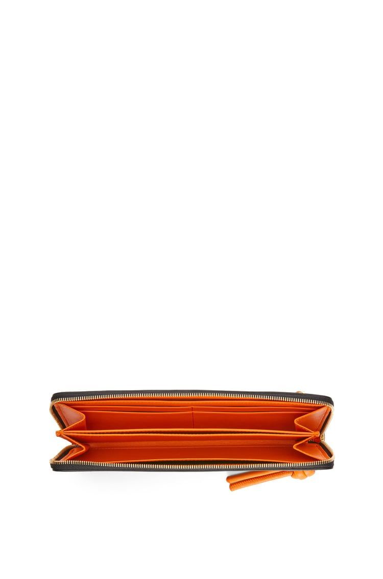Knot zip around wallet in shiny nappa calfskin