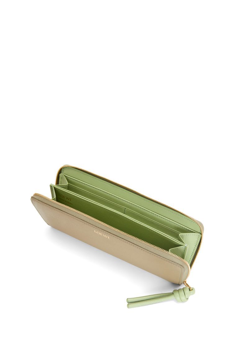 Knot zip around wallet in shiny nappa calfskin