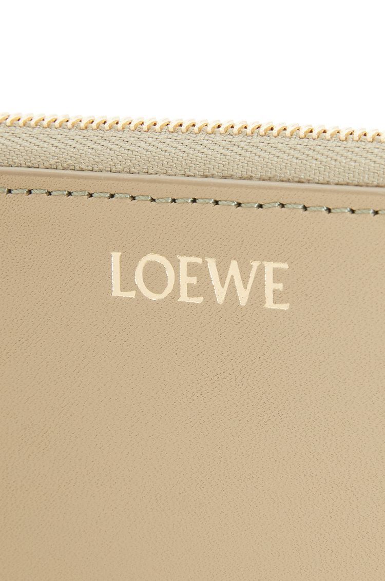 Knot zip around wallet in shiny nappa calfskin