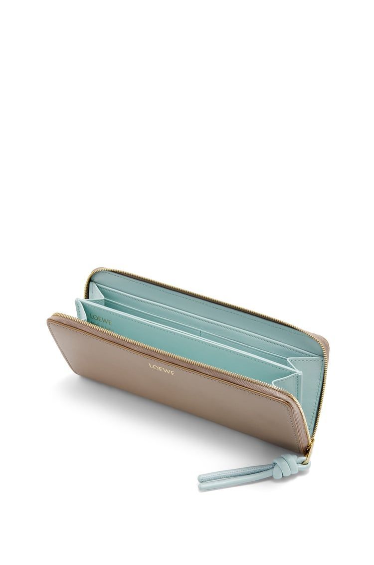 Knot zip around wallet in shiny nappa calfskin