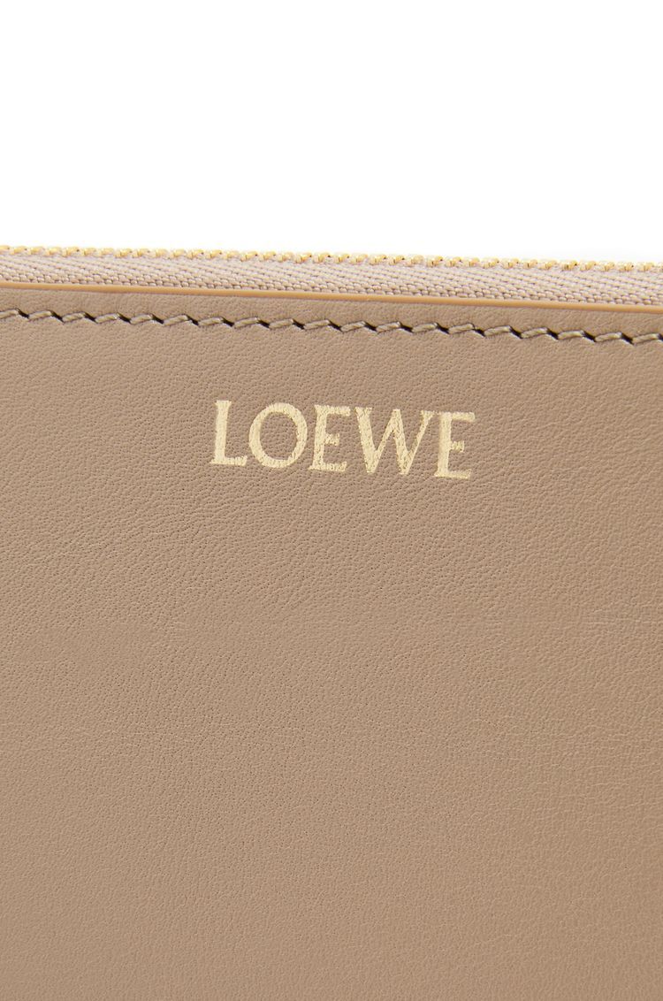 Knot zip around wallet in shiny nappa calfskin