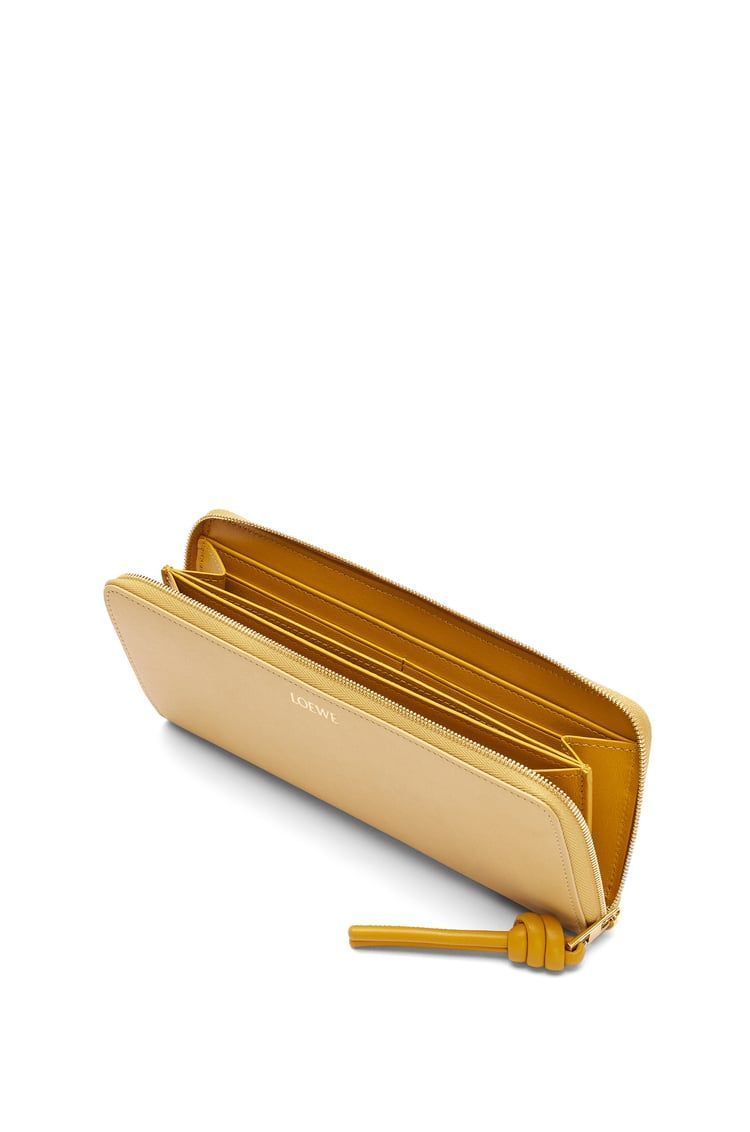 Knot zip around wallet in shiny nappa calfskin