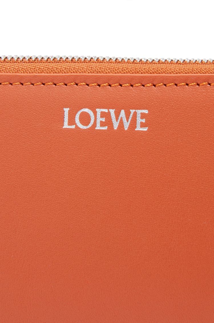 Knot zip around wallet in shiny nappa calfskin