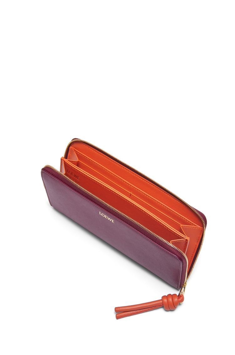 Knot zip around wallet in shiny nappa calfskin