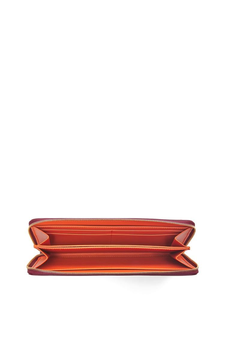 Knot zip around wallet in shiny nappa calfskin