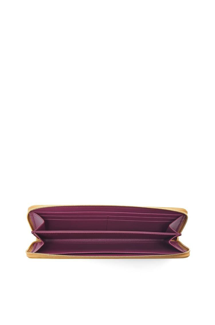 Knot zip around wallet in shiny nappa calfskin