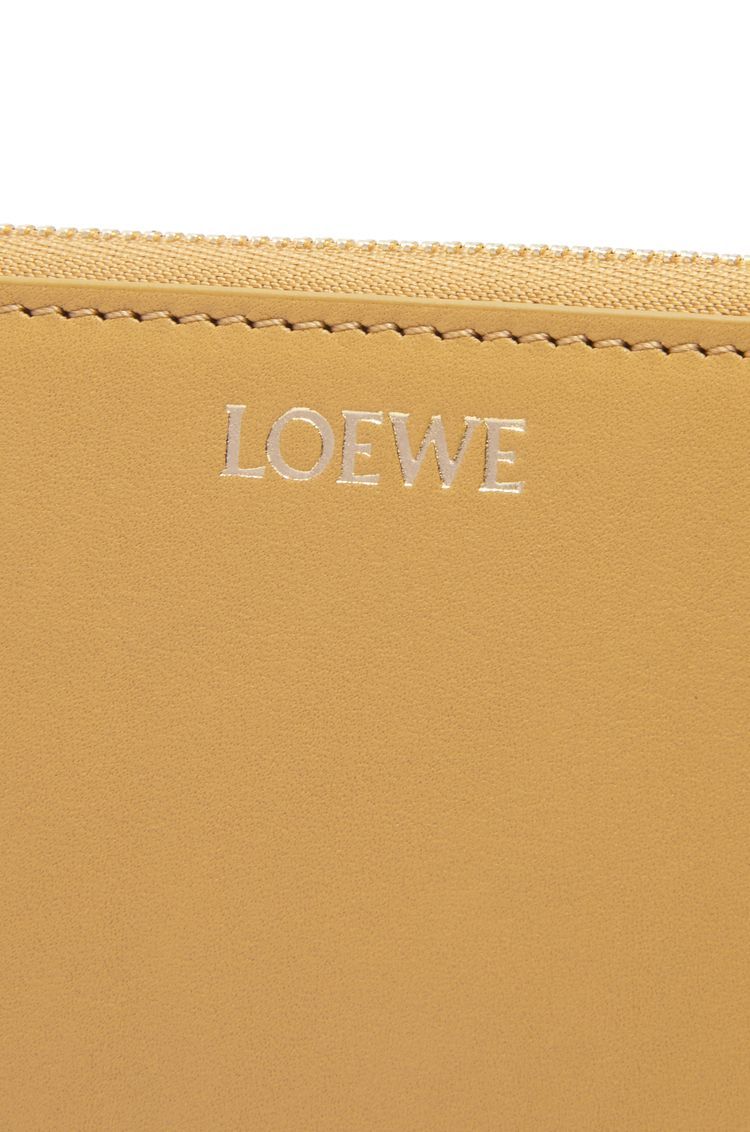Knot zip around wallet in shiny nappa calfskin