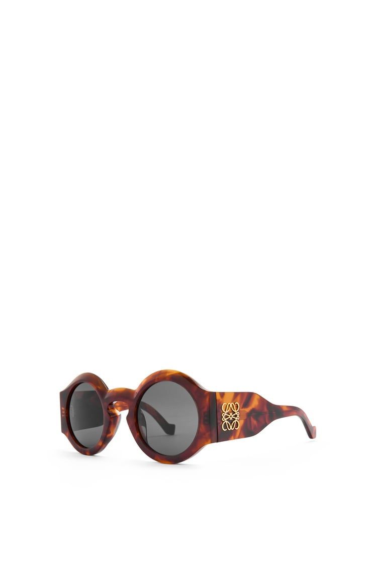 Curved sunglasses in acetate