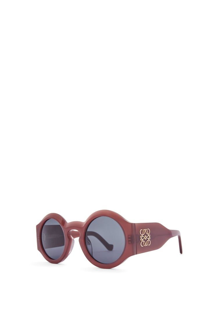 Curved sunglasses in acetate