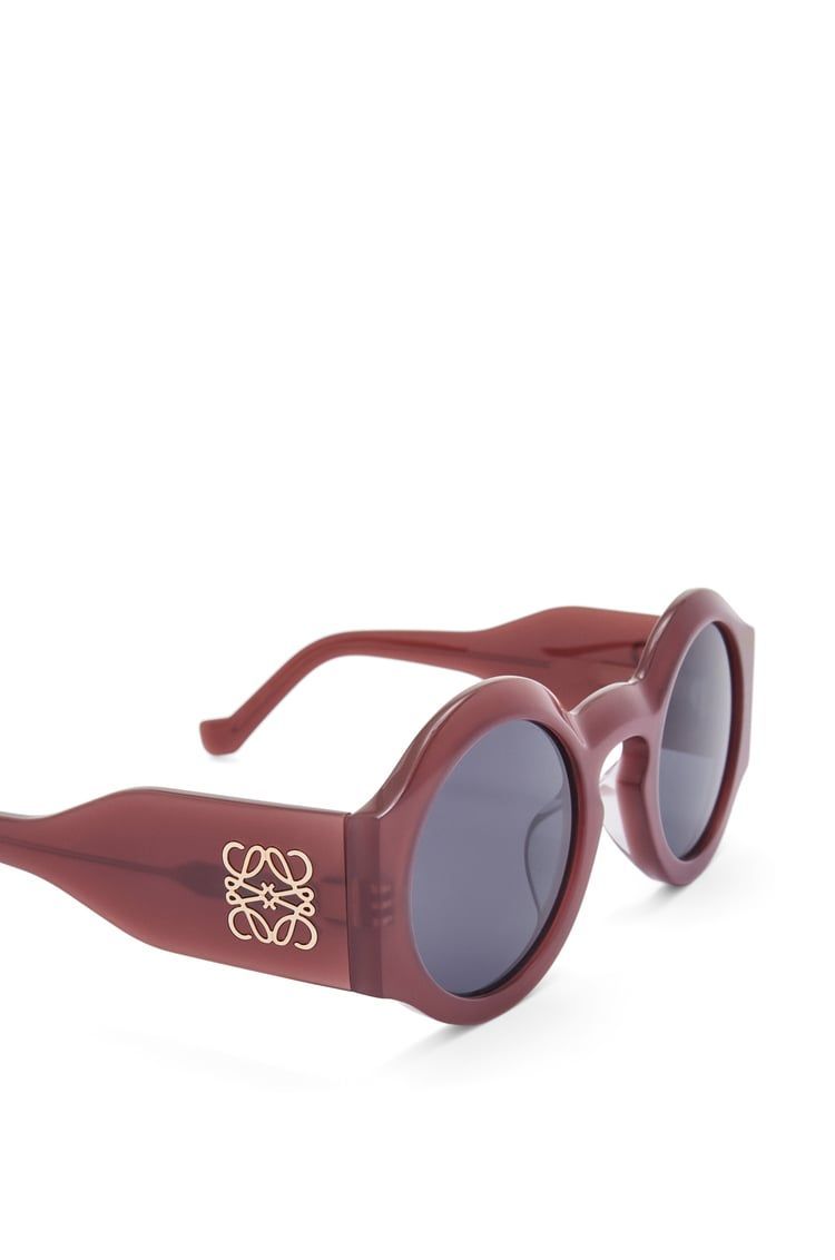 Curved sunglasses in acetate