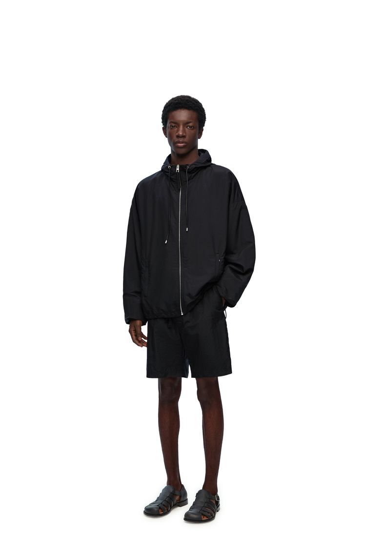 Hooded jacket in technical silk
