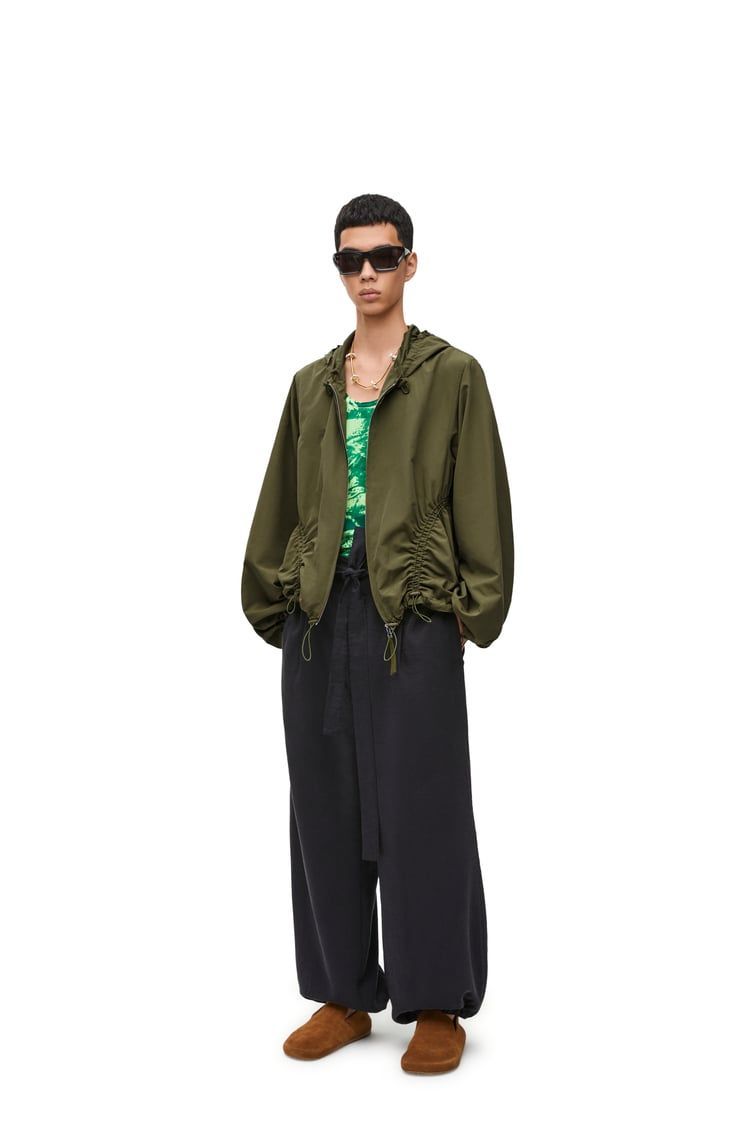 Hooded jacket in technical shell