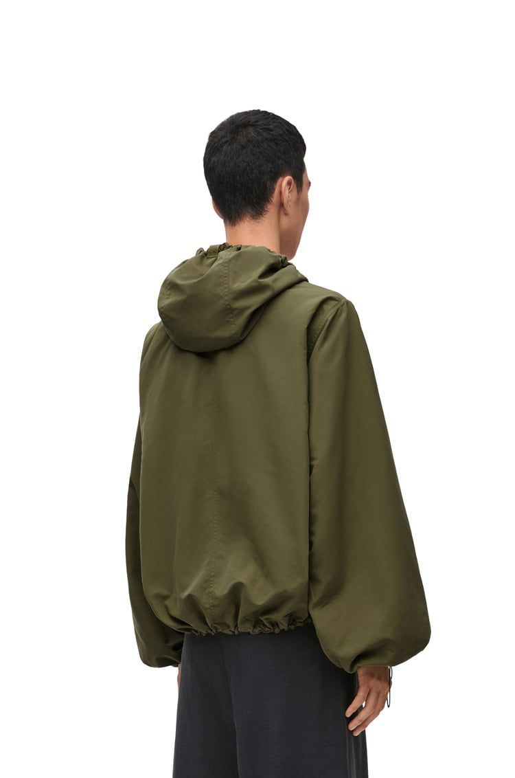Hooded jacket in technical shell
