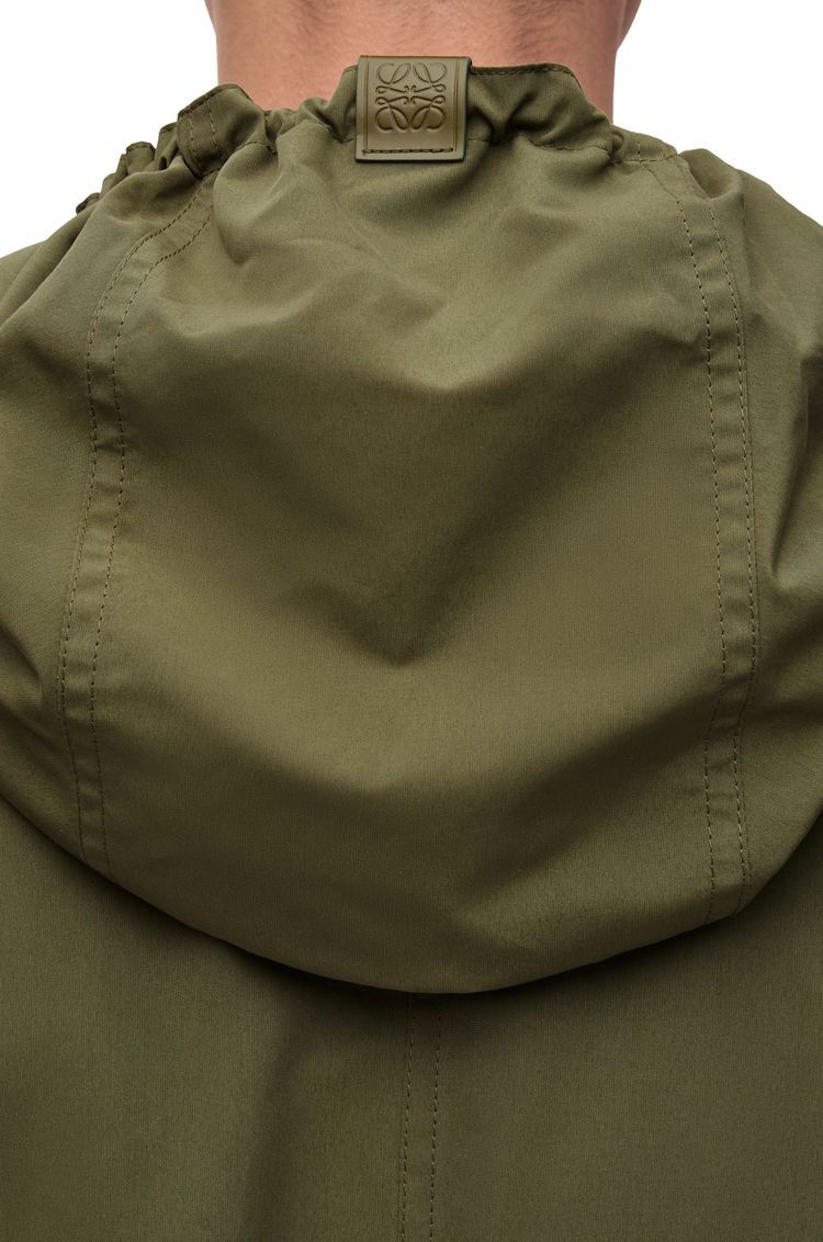 Hooded jacket in technical shell