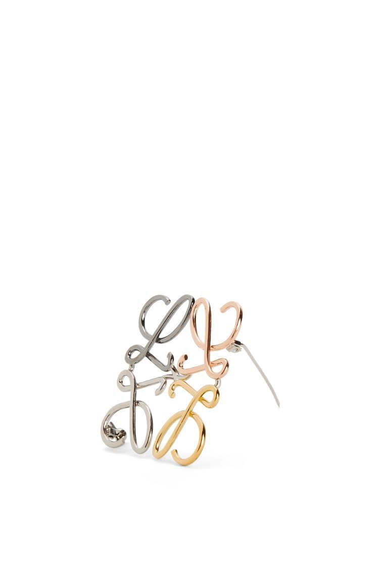 Anagram brooch in metal