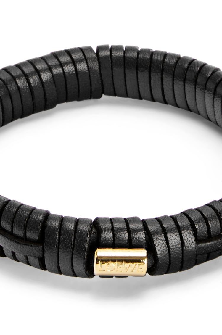 Woven bangle in brass and classic calfskin